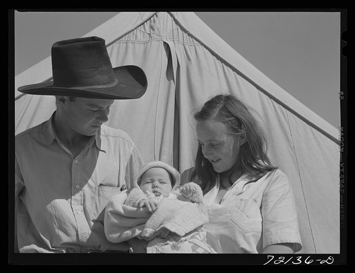 Family of farm workers who live at the FSA (Farm Security Administration) farm workers' community mobile unit. Friendly Corners, Arizona