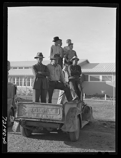 Farm workers watch events at the second annual field day at the FSA (Farm Security Administration) farm workers' community. Yuma, Arizona