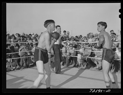 Untitled photo, possibly related to: Boxing match at the second annual field day at the FSA (Farm Security Administration) farm workers' community. Yuma, Arizona