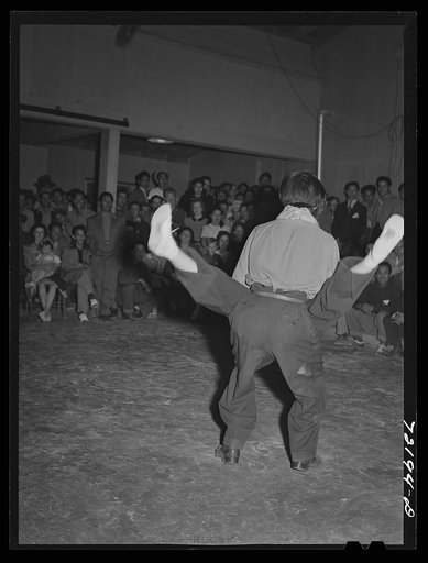 Untitled photo, possibly related to: Jitterbug contest at the dance which closed the second annual field day at the FSA (Farm Security Administration) farm workers' community. Yuma, Arizona
