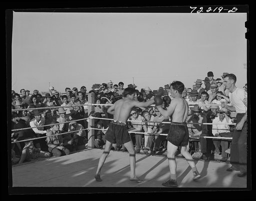 Boxing match at the second annual field day  at the FSA (Farm Security Administration) farm workers' community. Yuma, Arizona