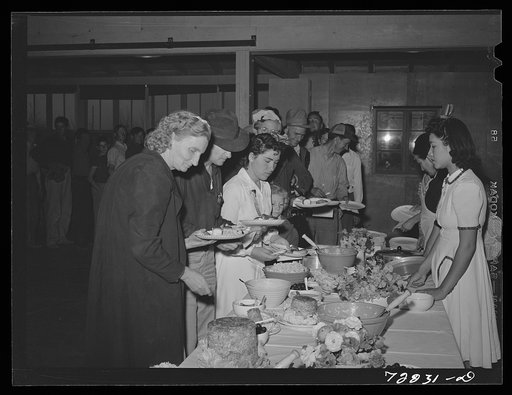 Untitled photo, possibly related to: Dinner in the community auditorium at the second annual field day at the FSA (Farm Security Administration) farm workers' community. Yuma, Arizona