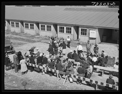 Los Angeles County, California. The evacuation of Japanese and Japanese-Americans from West coast areas under United States Army war emergency order. Japanese register on arrival at the Santa Anita reception center