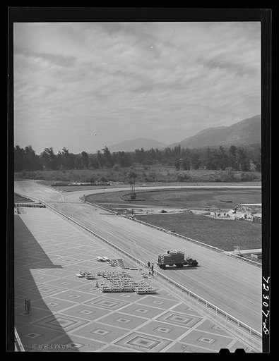 Los Angeles County, California. The evacuation of Japanese and Japanese-Americans from West coast areas under United States Army war emergency order. Part of the Santa Anita racetrack which is being converted into the reception center