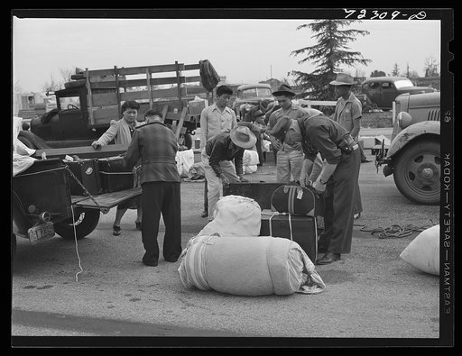 Los Angeles County, California. The evacuation of Japanese and Japanese-Americans from West coast areas under United States Army war emergency order. Luggage of the Japanese being examined when they arrive at the Santa Anita reception center
