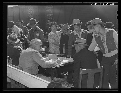 Santa Anita reception center, Los Angeles County, California. The evacuation of Japanese and Japanese-Americans from West coast areas under United States Army war emergency order. Japanese registering on arrival