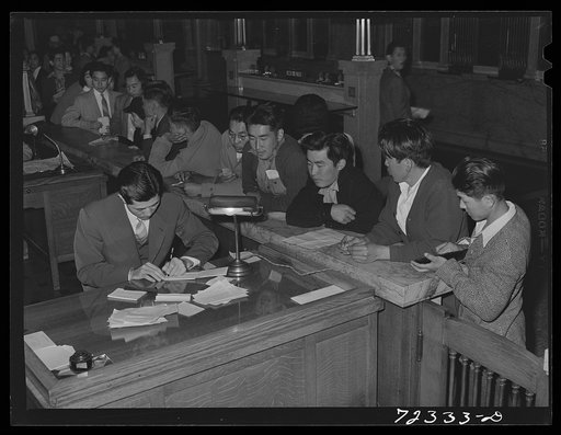 Los Angeles, California. The evacuation of Japanese-Americans from West coast areas under United States Army war emergency order. Japanese registering for travel permits for voluntary evacuation