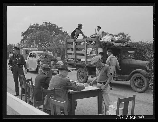 Santa Anita reception center, Los Angeles County, California. Japanese registering on arrival from West coast areas being evacuated under United States Army war emergency order