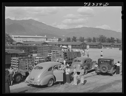 Los Angeles County, California. Japanese arriving at the Santa Anita reception center for Japanese evacuated under United States Army war emergency order