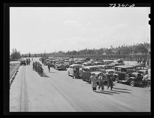 Los Angeles County, California. Japanese arriving at the Santa Anita reception center for Japanese evacuated under United States Army war emergency order