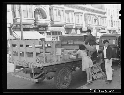 Los Angeles, California. The evacuation of Japanese-Americans from the West coast areas under United States Army war emergency order. Japanese pack their belongings as they close their stores in Little Tokyo
