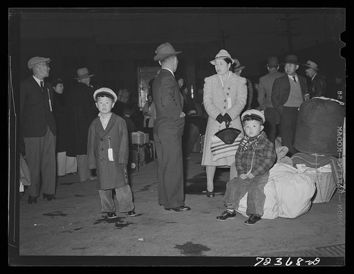 Los Angeles, California. The evacuation of Japanese-Americans from West coast areas under United States Army war emergency order. Japanese waiting for train