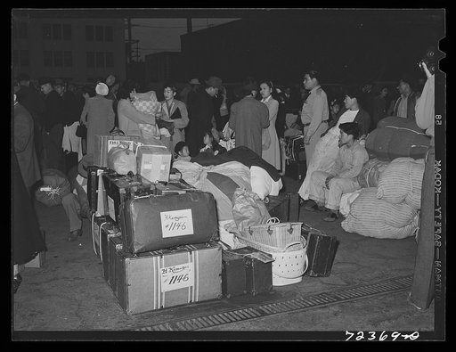 Los Angeles, California. The evacuation of Japanese-Americans from West coast areas under United States Army war emergency order. Japanese waiting for train
