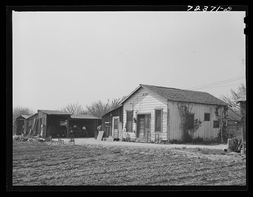Los Angeles County, California. The evacuation of Japanese-Americans from West coast areas under United States Army war emergency order. Farm and buildings of Japanese farmer