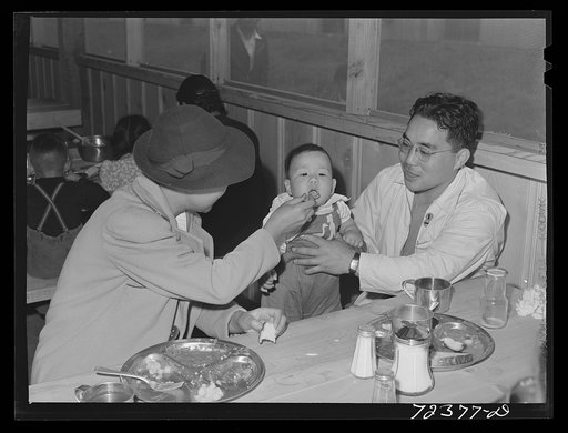 Los Angeles County, California. The evacuation of Japanese-Americans from West coast areas under United States Army war emergency order. Japanese family has its first meal in the mess hall