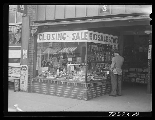 Los Angeles, California. The evacuation of Japanese-Americans from the West coast areas under United States Army war emergency order. Evacuation prices advertised in stores in Little Tokyo