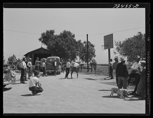 San Juan Bautista, California. While waiting for final evacuation orders, young Japanese-Americans, members of the Japanese Citizens League, gather for a picnic
