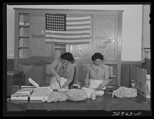 San Juan Bautista, California. Japanese-American girls getting ready for a picnic which they had prior to their evacuation
