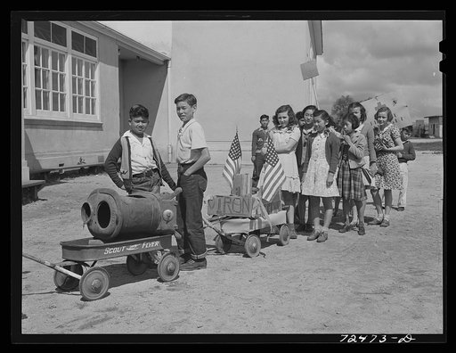 San Juan Bautista, California. Schoolchildren parading with scrap metal they have collected for the war