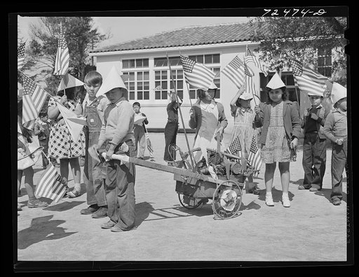 San Juan Bautista, California. Schoolchildren parading with scrap metal they have collected for the war