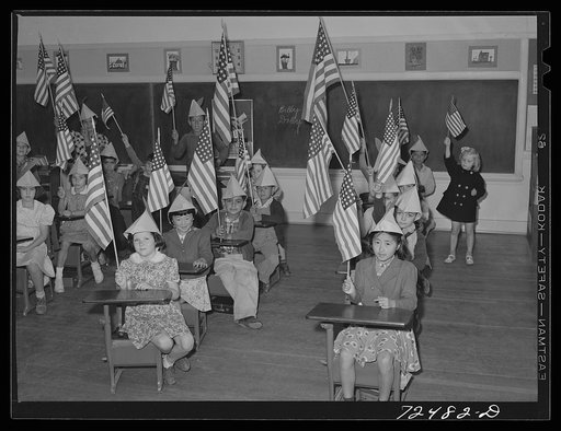 San Juan Bautista, California. Schoolchildren assembled to march in parade with the scrap metal they have collected for war