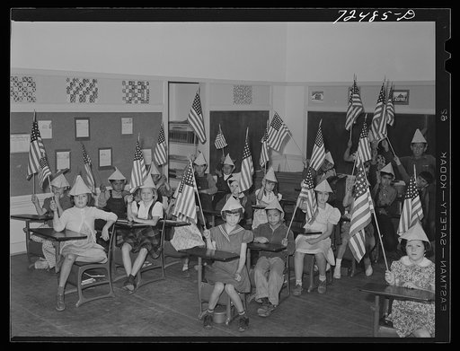 Untitled photo, possibly related to: San Juan Bautista, California. Schoolchildren assembled to march in parade with the scrap metal they have collected for war