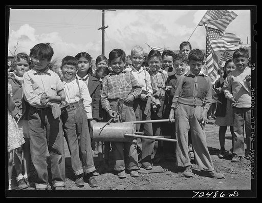 San Juan Bautista, California. Schoolchildren assembled to march in parade with the scrap metal they have collected for war
