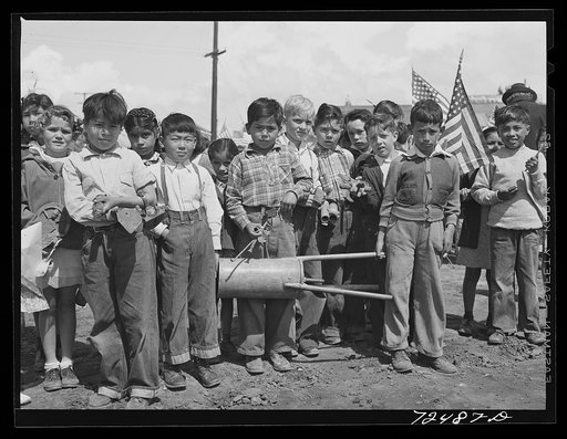 Untitled photo, possibly related to: San Juan Bautista, California. Schoolchildren assembled to march in parade with the scrap metal they have collected for war