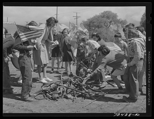 San Juan Bautista, California. Schoolchildren assembled to march in parade with the scrap metal they have collected for war