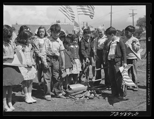 San Juan Bautista, California. Schoolchildren assembled to march in parade with the scrap metal they have collected for war