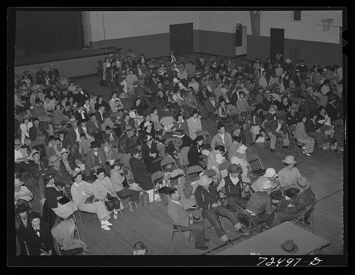 Salinas, California. Japanese-Americans being evacuated from certain West coast areas under United States Army war emergency order, and waiting for transportation to the reception center