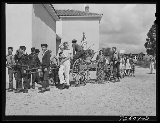 San Juan Bautista, California. Schoolchildren who have collected scrap metal for war