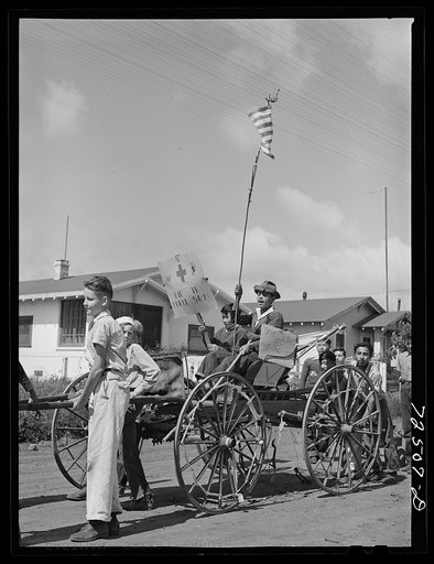 San Juan Bautista, California. Schoolchildren parading with scrap metal which they have collected for war