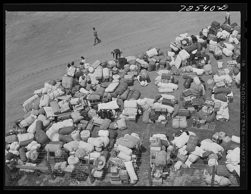 Los Angeles (vicinity), California. Baggage of Japanese-Americans evacuated from certain West coast areas under United States Army war emergency order, who have arrived at a reception center at a racetrack