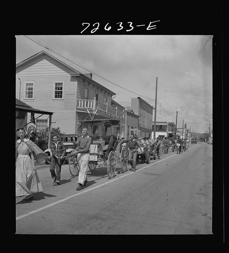 San Juan Bautista, California. Schoolchildren parading with scrap metal which they have collected for the war