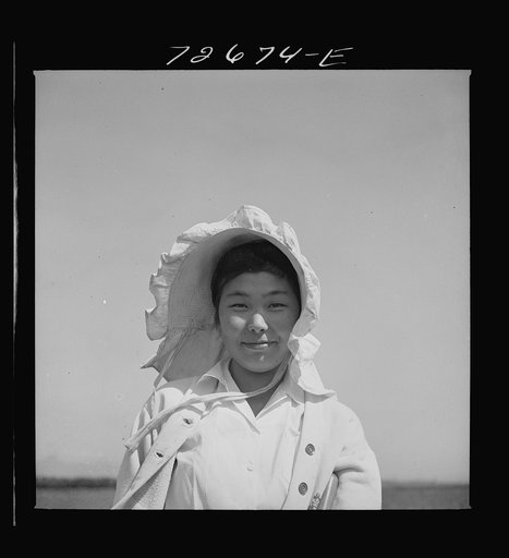 San Benito County, California. Japanese-American who is working in field while awaiting final evacuation orders