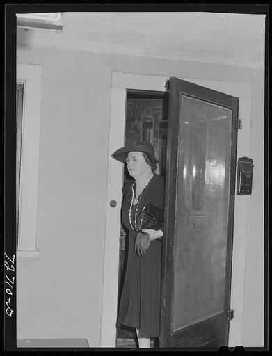 Untitled photo, possibly related to: Turlock, California. Housewife leaves for shopping trip in town