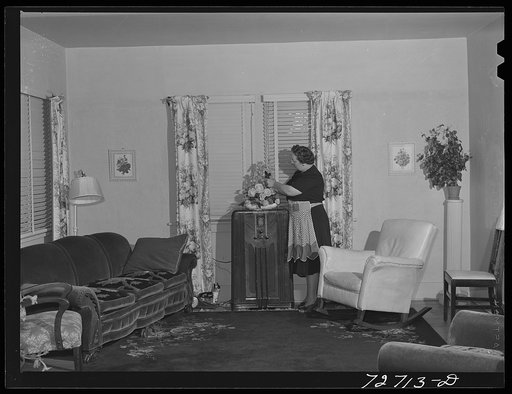 Turlock, California. Housewife in front room of her home