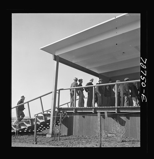 Untitled photo, possibly related to: Vallejo, California. Workmen from shipyards at office of FSA (Farm Security Administration) dormitories