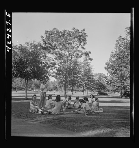 Redding, California. Girls picnicking at municipal park and beach on Sacramento River