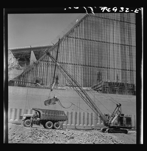 Untitled photo, possibly related to: Shasta Dam, Shasta County, California. Loading truck with excavated dirt