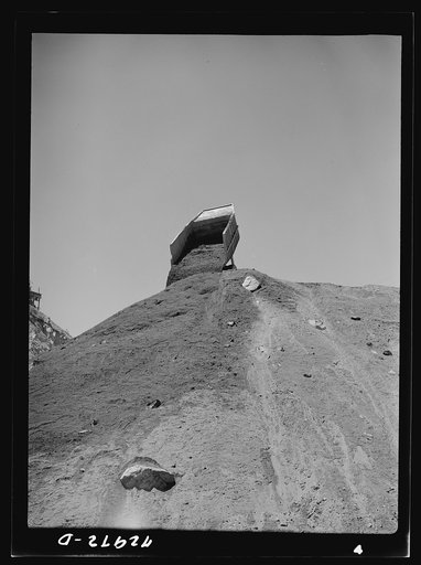Untitled photo, possibly related to: Shasta Dam, Shasta County, California. Dumping load of dirt which has been excavated at site of the dam
