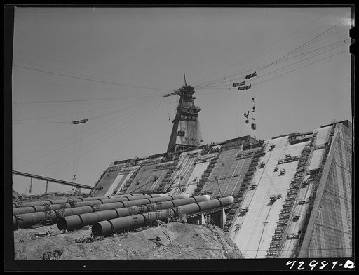 Shasta Dam, Shasta County, California. Face of the dam under construction, showing the penstocks which will carry water to the hydroelectric plant