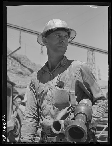 Untitled photo, possibly related to: Shasta Dam, Shasta County, California. Pipe-fitter