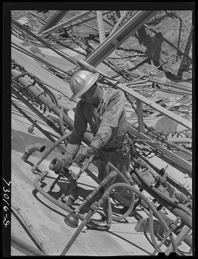 Shasta Dam, Shasta County, California. Pipe fitter