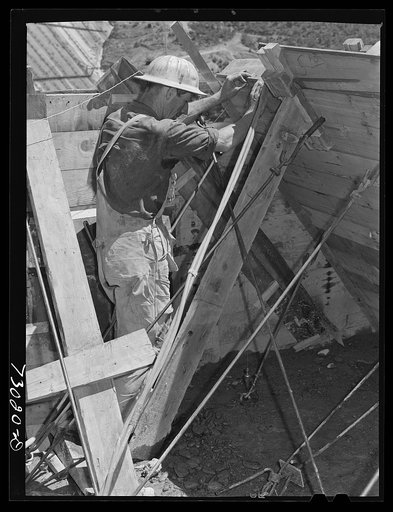 Shasta Dam, Shasta County, California. Carpenter constructing concrete forms