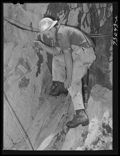 Shasta Dam, Shasta County, California. Carpenter with plumb line