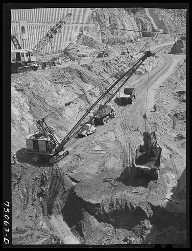 Shasta Dam, Shasta County, California. Steam shovels and dump trucks excavate at the dam