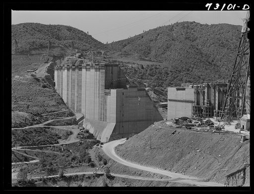 Shasta Dam, Shasta County, California. The two sides of the dam are fast bridging the gap through which the Sacramento river now flows