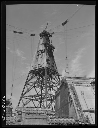 Shasta Dam, Shasta County, California. Head tower. The cables which operate from this tower to several tail towers carry cable cars and buckets which supply materials to the construction areas of the dam